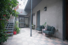 Green filled home with rooftop BBQ